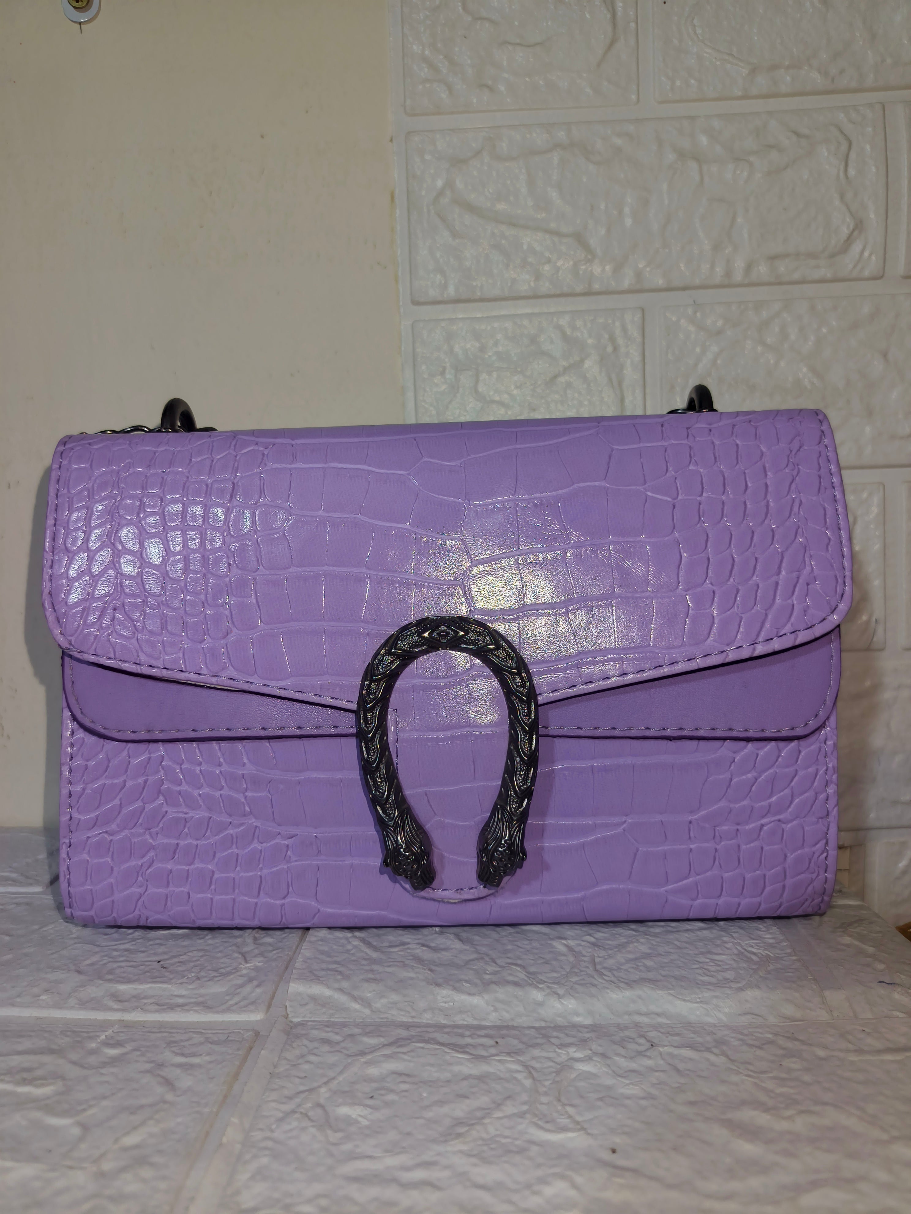 Marina Galanti small croc-embossed leather crossbody bag.