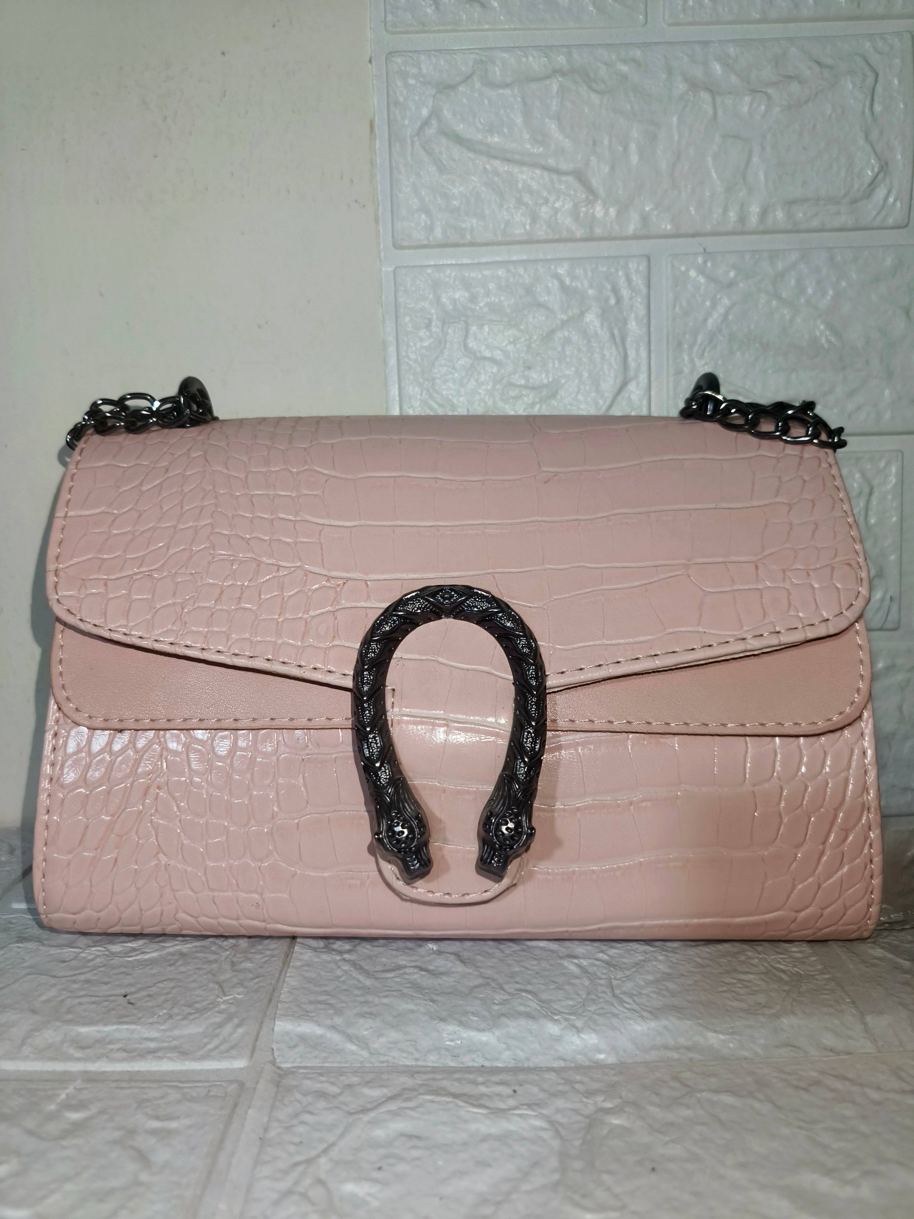 Marina Galanti small croc-embossed leather crossbody bag.