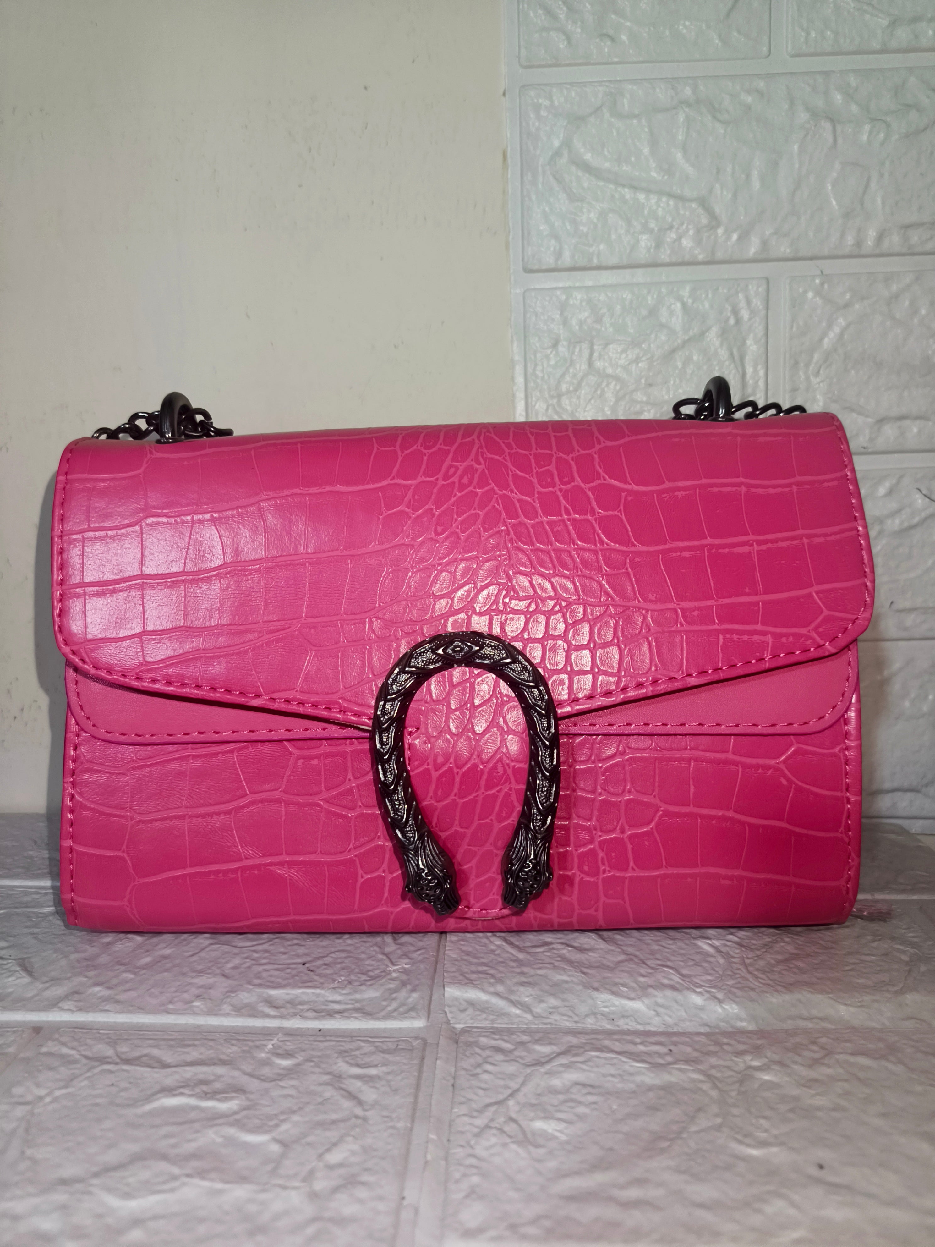 Marina Galanti small croc-embossed leather crossbody bag.