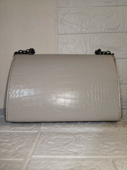 Marina Galanti small croc-embossed leather crossbody bag.