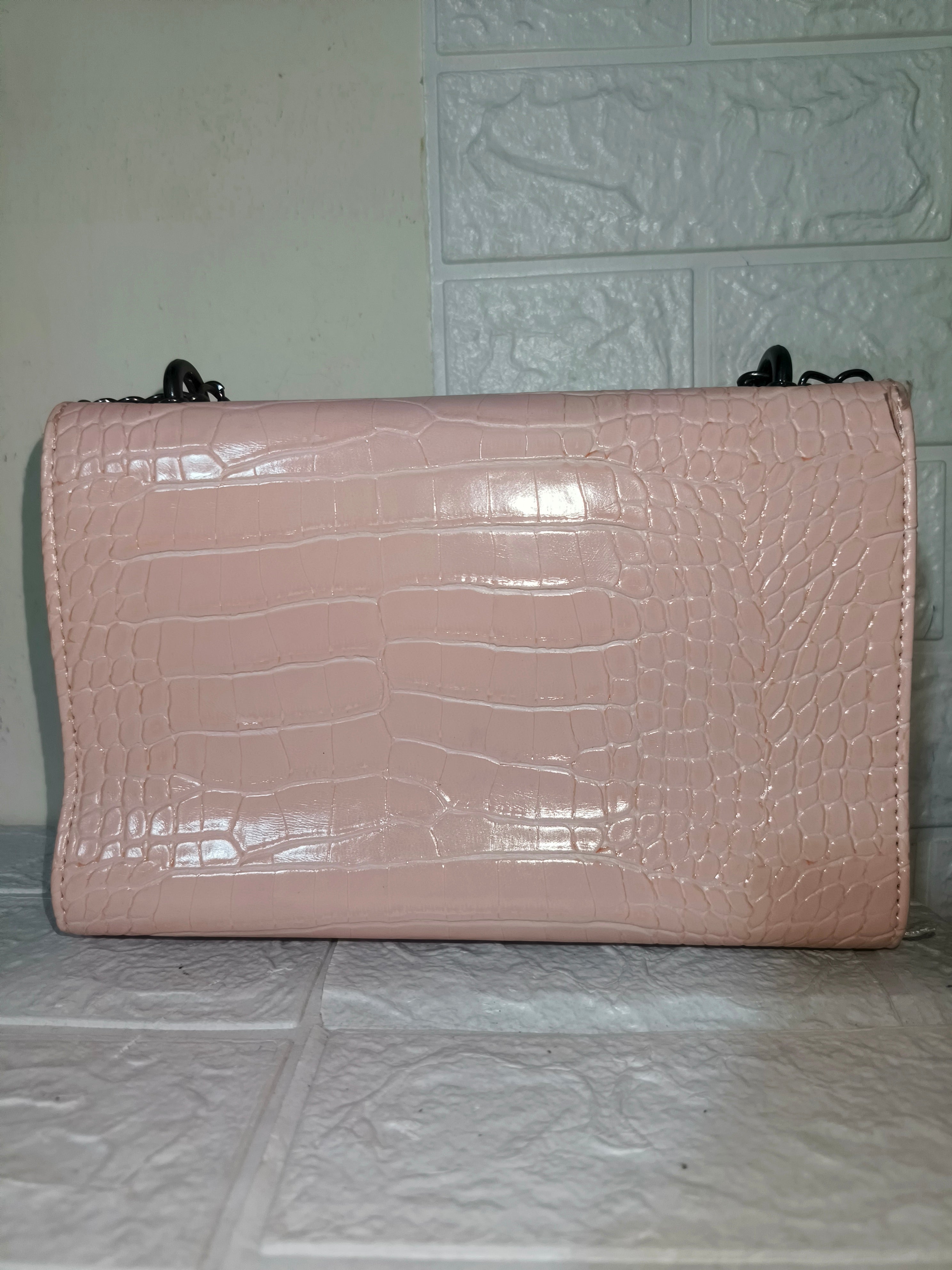 Marina Galanti small croc-embossed leather crossbody bag.